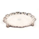 An Edwardian silver salver, London 1901, 26cms diameter, 692g.