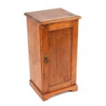 A late 19th century pine pot cupboard, 39cms wide; together with a similar pot cupboard, 39cms