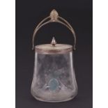 A WMF cut glass biscuit barrel with blue enamel decoration, 14cms high.