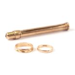 Two 9ct gold wedding bands, 3.5g; together with a 9ct gold pencil, 10.6g (3).