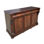 A 19th century flame mahogany sideboard or chiffonier with three frieze drawers above panelled