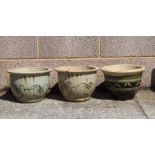 A pair of glazed pottery circular planters decorated with bamboo, 30cms diameter; together with