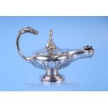 A late Victorian silver table oil lamp with griffin terminal to the scroll handle, William