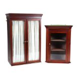 A Victorian mahogany side cabinet with twin glazed doors, 70cms wide (probably the upper section