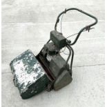 An Atko self propelled petrol lawn mower with 20ins cut blade.
