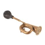 A brass car horn, 46cms long.