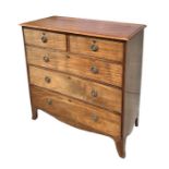 A 19th century mahogany chest of two short and three graduated long drawers, on splay bracket