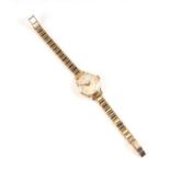 A ladies Zenith 9ct gold bracelet watch with 9ct gold strap.Condition Report22.8g