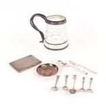 A quantity of assorted silver items to include a cigarette case with engine turned decoration;