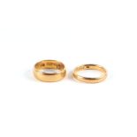 Two 22ct gold wedding bands, 9.7g (2).