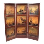 A wooden three-fold screen, each fold with three panels painted with hanging game, the reverse