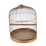 A gilt metal bird cage, 30cms high.
