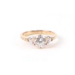 A 9ct gold three-stone cubic zirconia ring, approx UK size 'N', 2.6g.