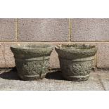 A pair of reconstituted stone circular planters, 34cms diameter (2).