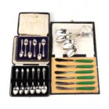 A boxed set of six silver teaspoons, Sheffield 1935; together with a boxed set of six silver
