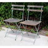 A pair of vintage French folding garden chairs (2).