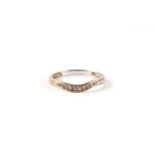 A 9ct gold and diamond wishbone ring, approx UK size 'L', 1.2g.