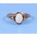A 9ct gold opal ring, approx UK size 'K', 1.7g.
