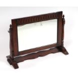 An oak framed dressing table mirror, 69cms wide.