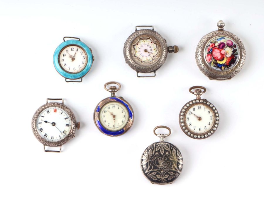A group of silver cased fob watches including enamel examples together with watches and watch cases.