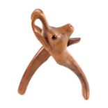 A pair of Black Forest style carved nut crackers in the form of a Chamois Goat with glass eyes,