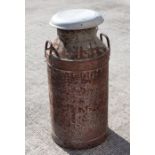 A United Dairies Ltd galvanised milk churn, 75cms high.