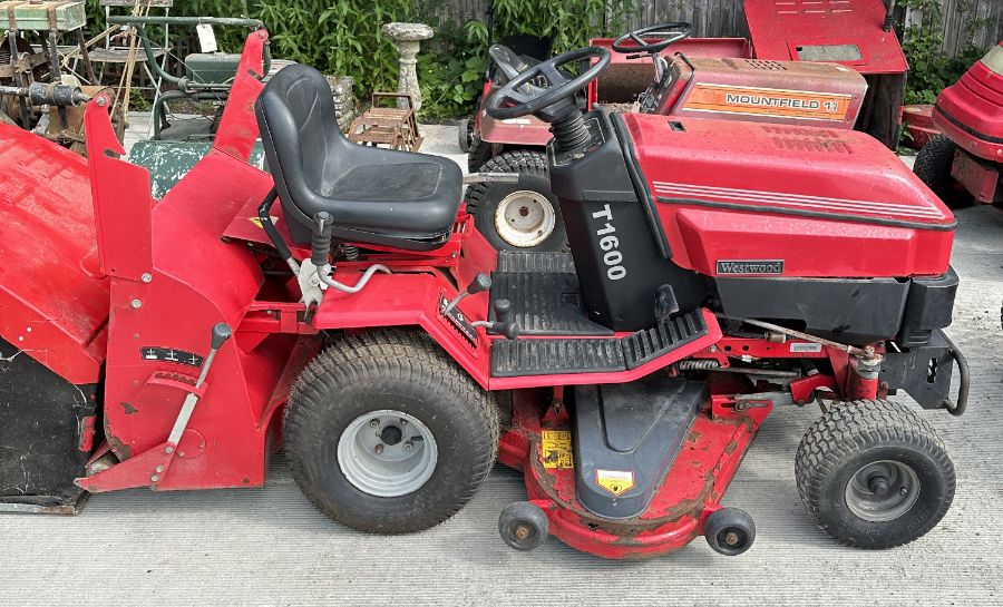 A Westwood T1600 ride-on petrol lawn mower, together with grass collection box.