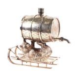 A silver plated spirit flask in the form of a barrel being supported by a bear on a sleigh, 20cms