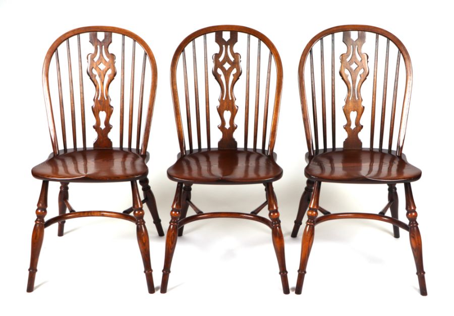 A set of six oak wheelback dining chairs with crinoline stretchers; together with an oak oval - Image 4 of 4