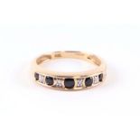 A 9ct gold diamond and sapphire ring, approx UK size 'L', 2g.