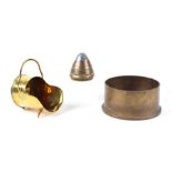 A trench art miniature coal scuttle; together with an artillery shell fuse; and a mortar shell