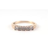 A 9ct gold five-stone diamond half hoop ring, approx UK size 'P', 2.2g.