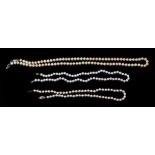 A cultured pearl necklace with 9ct gold clasp, approx 50cms long; together with another similar,