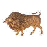 A gilt metal figure depicting a bison, 17cms long.Condition Report The front right leg has been