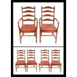 A set of Six Ercol ladderback dining chairs.