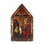 A painted wooden icon depicting the crucifixion of Christ, on a gilt ground, 18 by 29cms.
