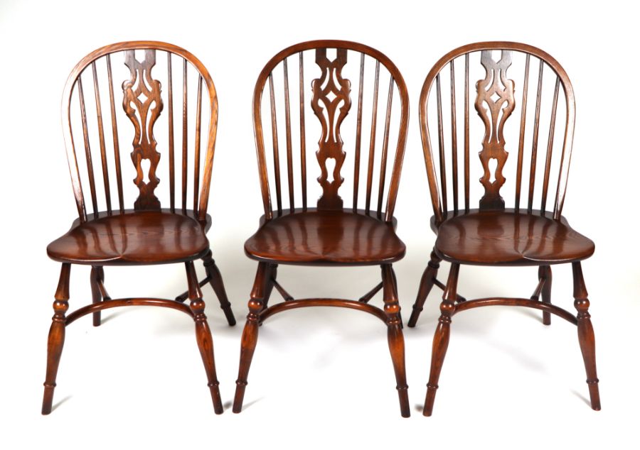 A set of six oak wheelback dining chairs with crinoline stretchers; together with an oak oval - Image 3 of 4