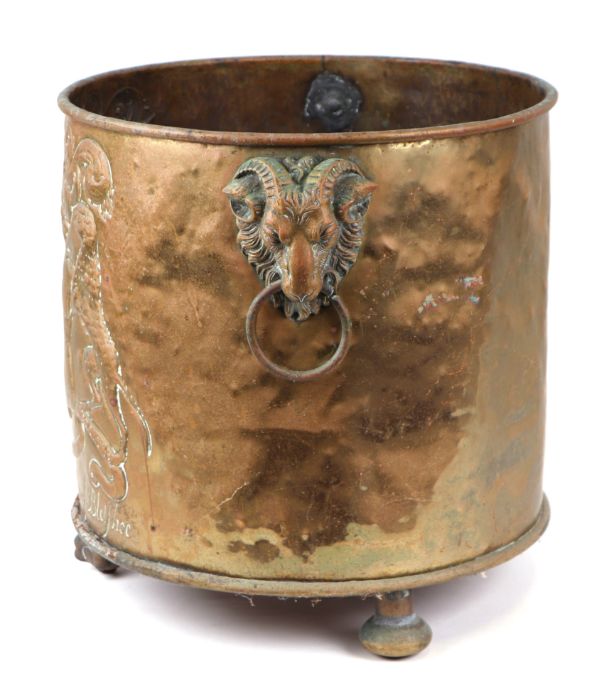 A large brass log bin decorated in relief with the family crest of John Lord of Bletso, 39cms - Image 2 of 3