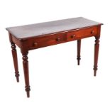 A Victorian mahogany side table with three frieze drawers, on ring turned legs, 108cms wide;