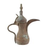 A Turkish / Islamic brass dallah coffee pot, 30cms high.