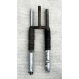 A pair of Norton front forks, we are advised by the vendor that there is a new sanction and new