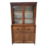 A Victorian mahogany secretaire bookcase, the upper bookcase section with twin glazed drawers