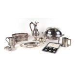 A quantity of silver plate to include a breakfast turnover dish, coffee pot and flatware.