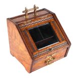 A late Victorian oak novelty stationary box in the form of a coal scuttle having a glazed door