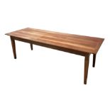 A French cherrywood farmhouse table, the rectangular on tapering square legs, 86cm by 240cm long,