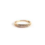 A 9ct gold and diamond half hoop ring, approx UK size 'N', 2g.