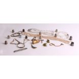 A quantity of assorted costume jewellery, pen knives and thimble, including silver examples.