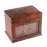 A Victorian figured walnut jewellery box, the lift-up lid enclosing a fitted interior with fall-flap