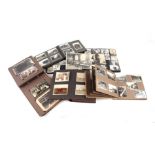 A quantity of assorted early 20th century photograph albums containing various black & white