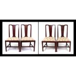 A set of late 19th century Queen Ann style mahogany dining chairs with vase shaped back splats,